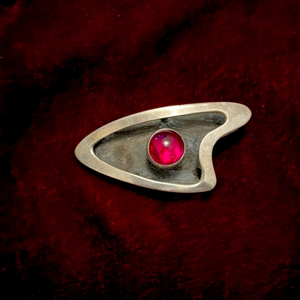 Groovy silver brooch, circa 1970s.